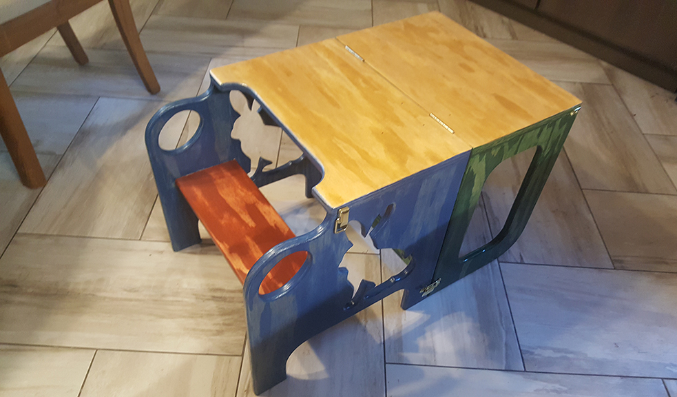 A convertible child's step-stool/table 